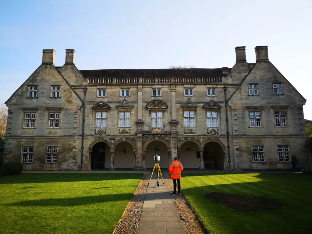 Man performing a Laser Scan of the The Pepys library Cambridge
